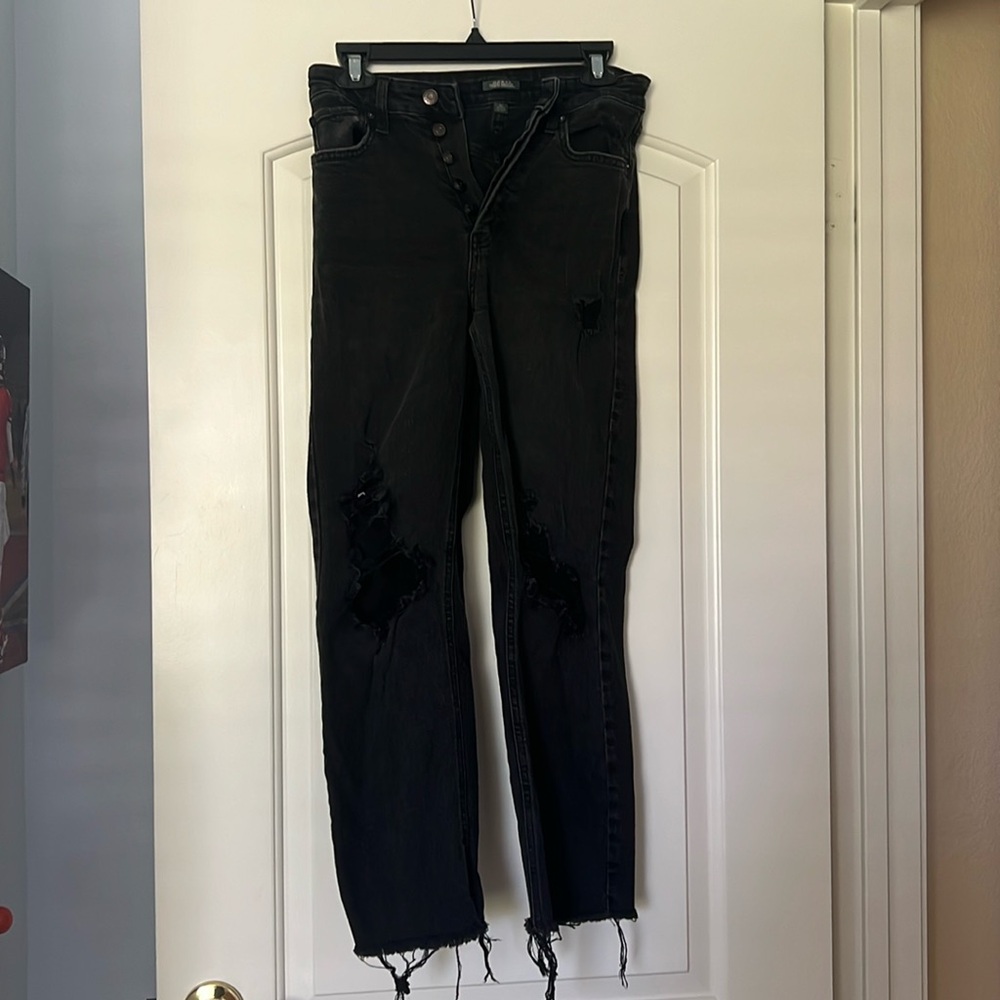 Distressed black denim